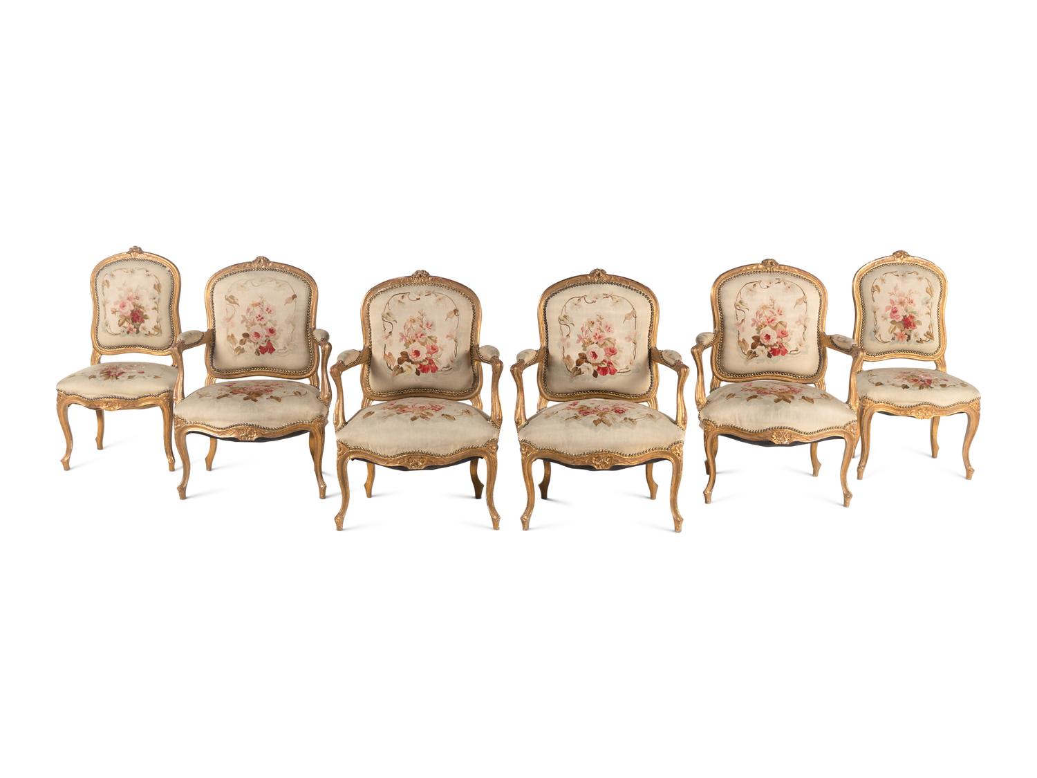 A Louis XV Style Giltwood Seven-Piece Salon Suite