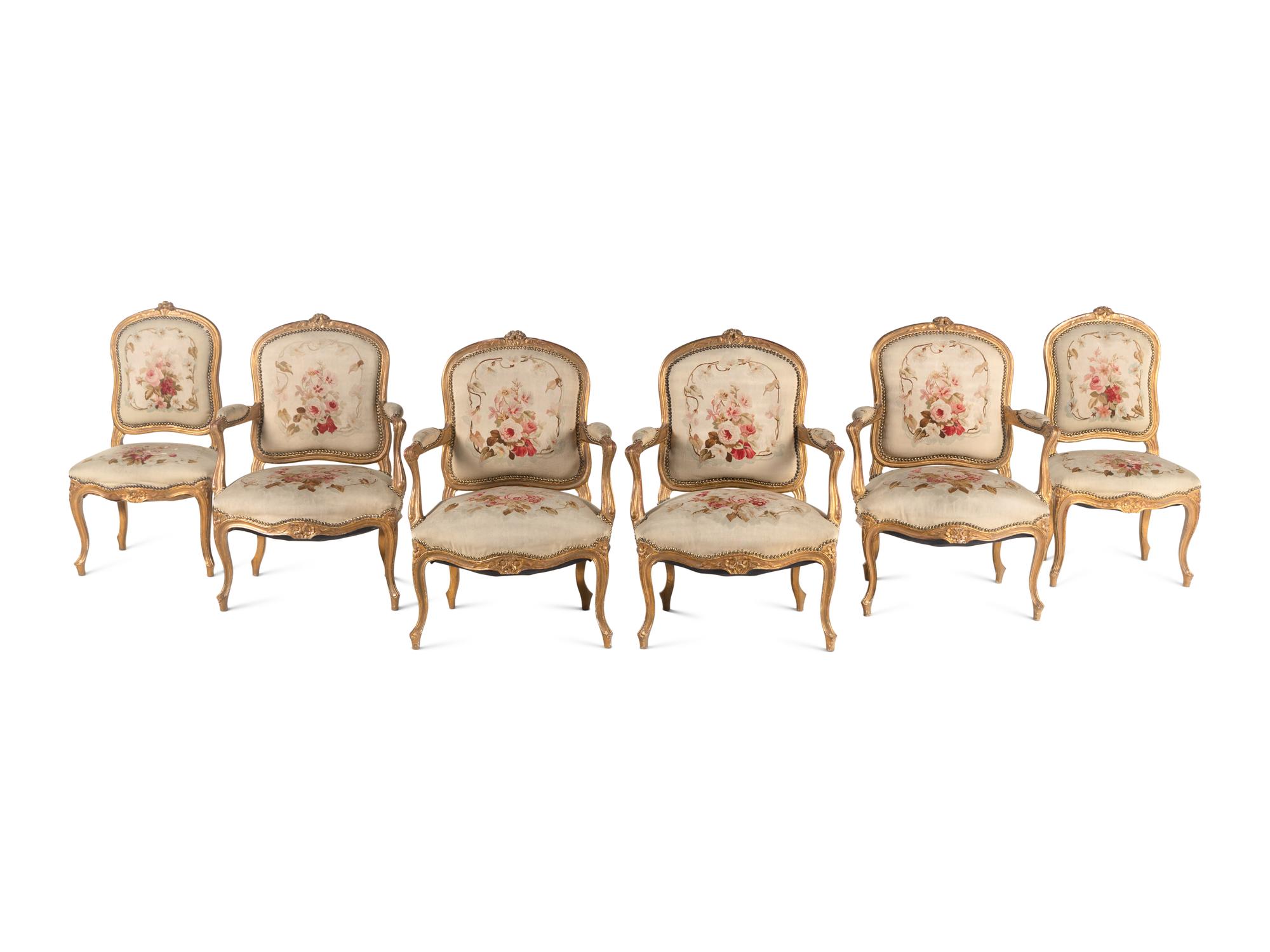 A Louis XV Style Giltwood Seven-Piece Salon Suite