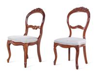A Pair of Victorian Carved Walnut Side Chairs