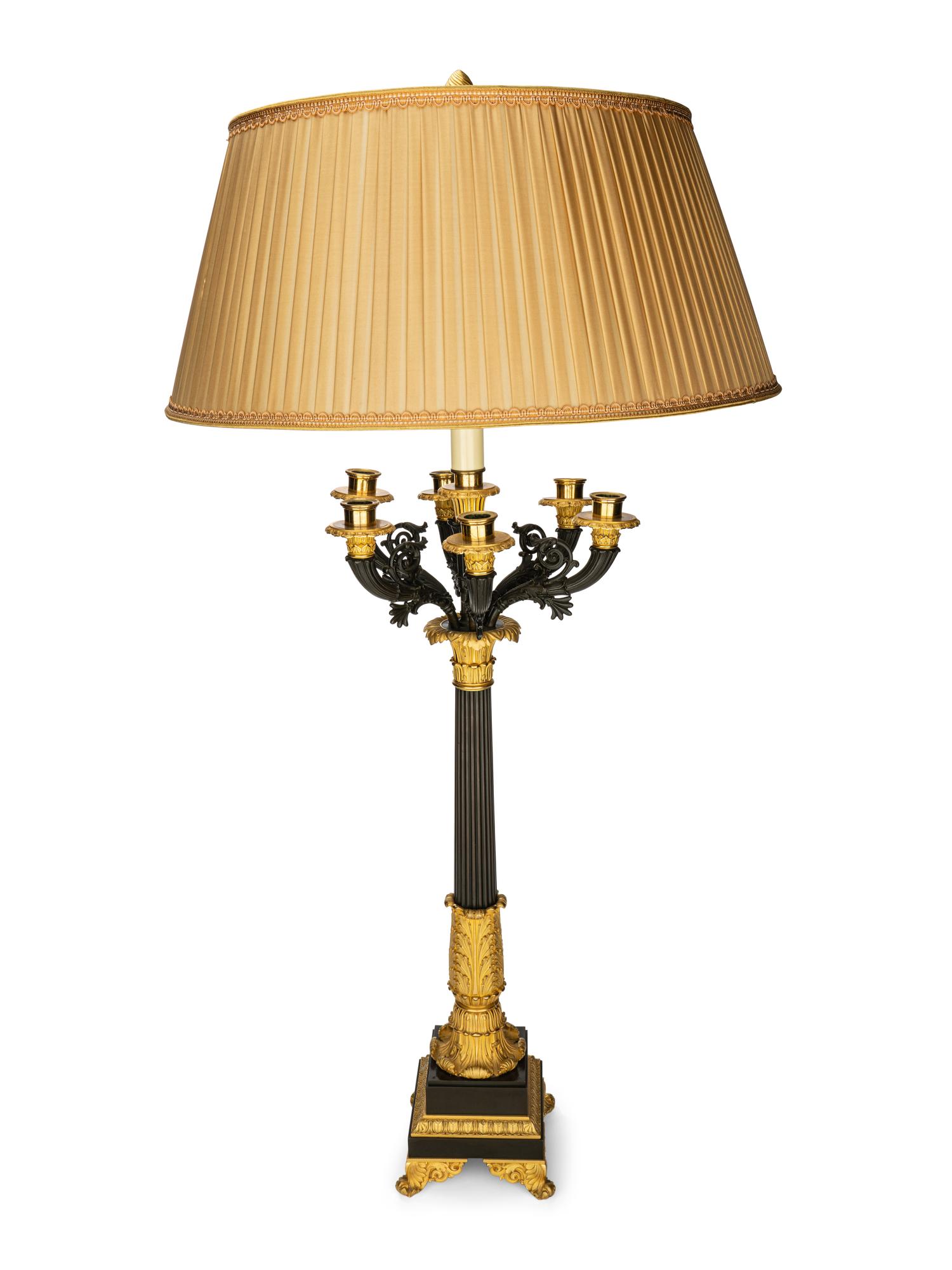 A Pair of Louis Philippe Gilt and Patinated Bronze Seven-Light Candelabra