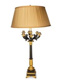 A Pair of Louis Philippe Gilt and Patinated Bronze Seven-Light Candelabra