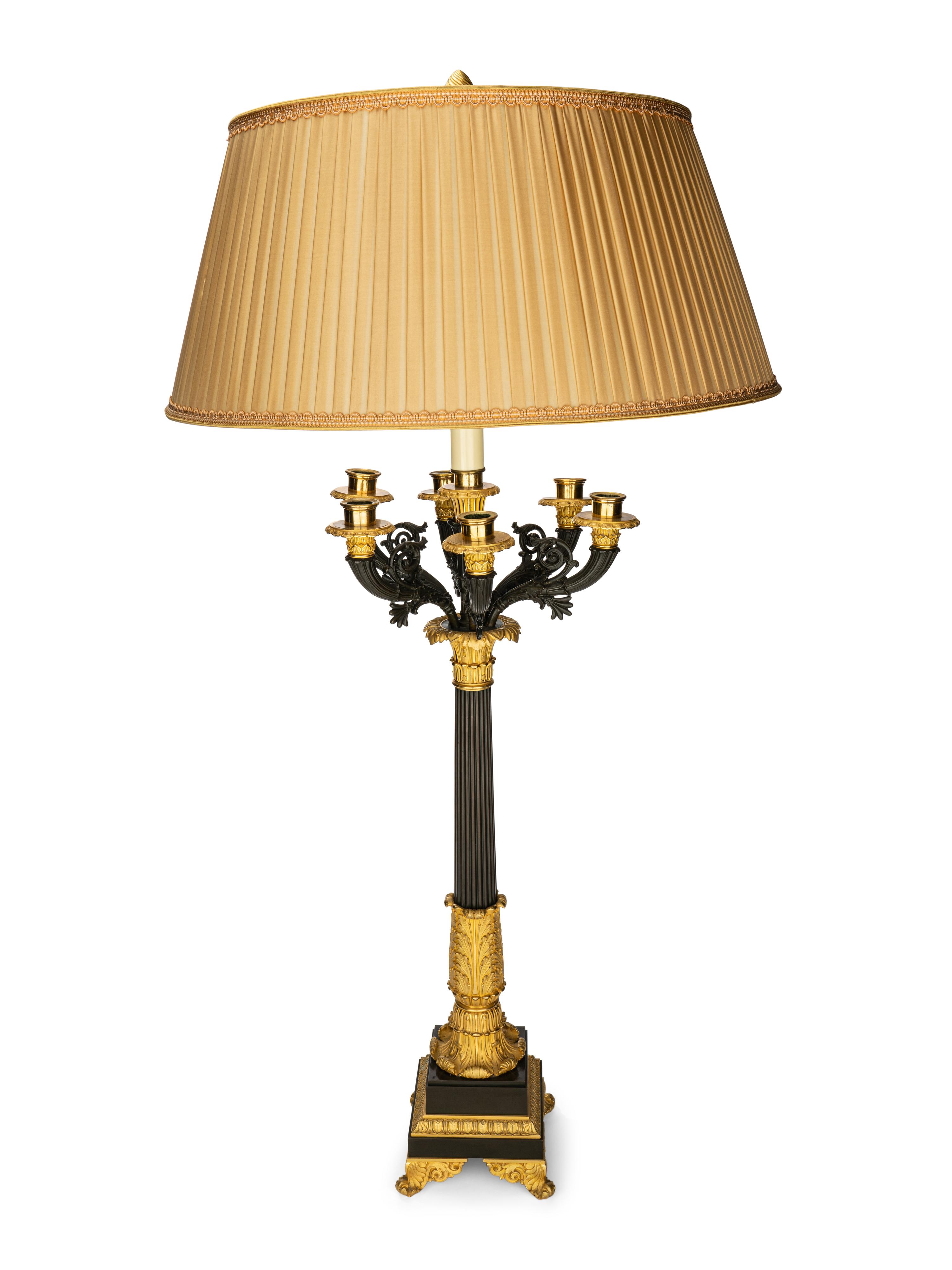 A Pair of Louis Philippe Gilt and Patinated Bronze Seven-Light Candelabra