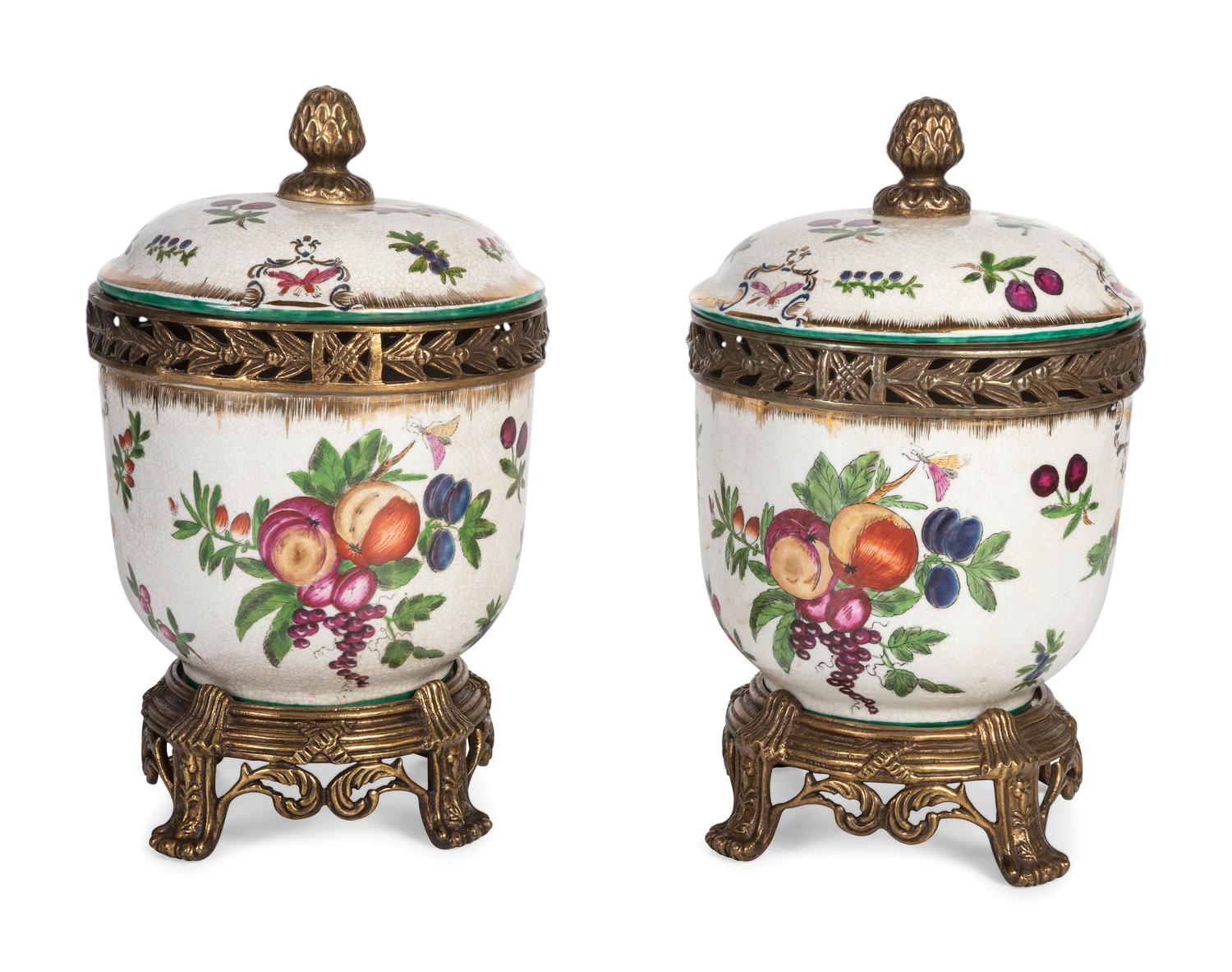 A Pair of United Wilson Gilt Metal Mounted Porcelain Urns