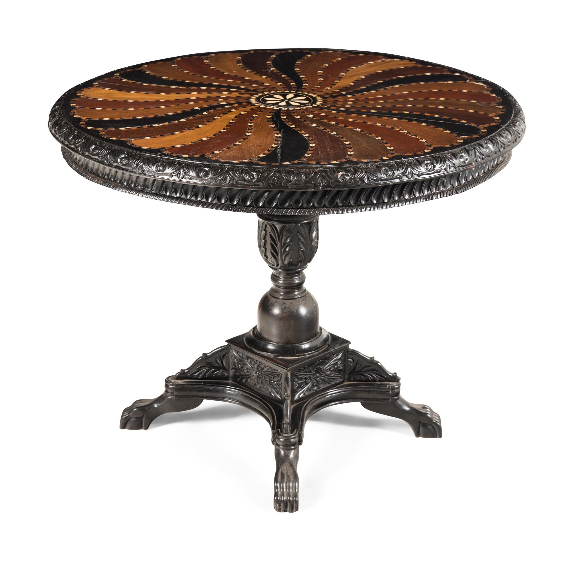 An Anglo-Indian Ebony and Specimen Wood Center Table