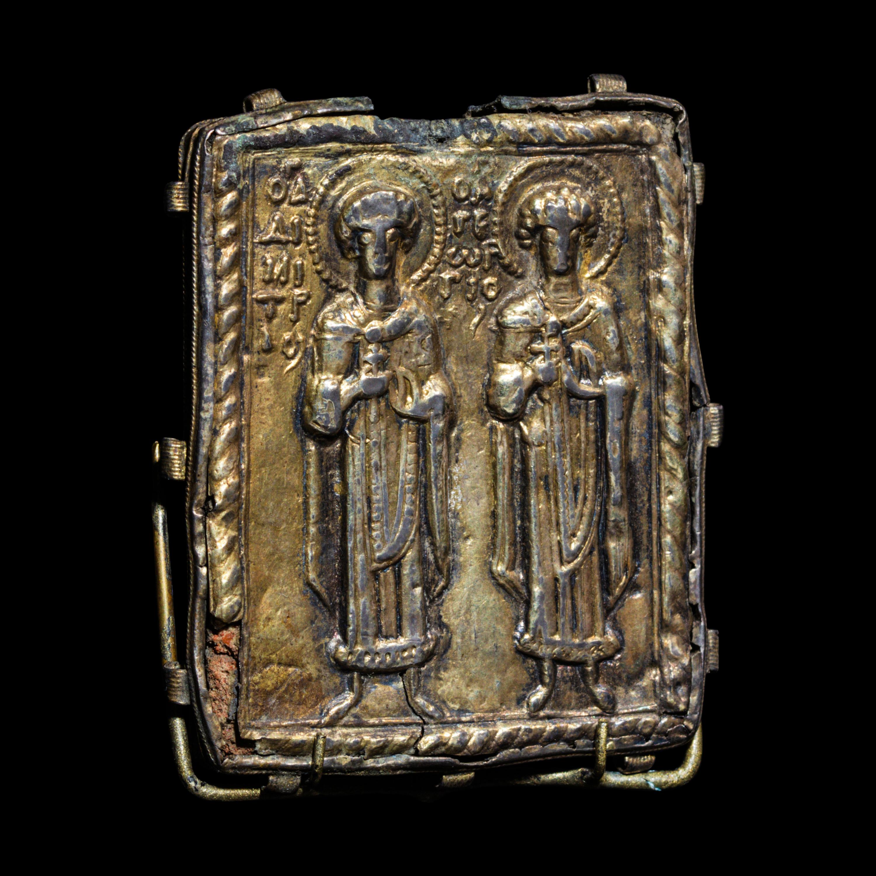 A Byzantine Gilt-Silver Enkolpion with Saints Demetrios and George
