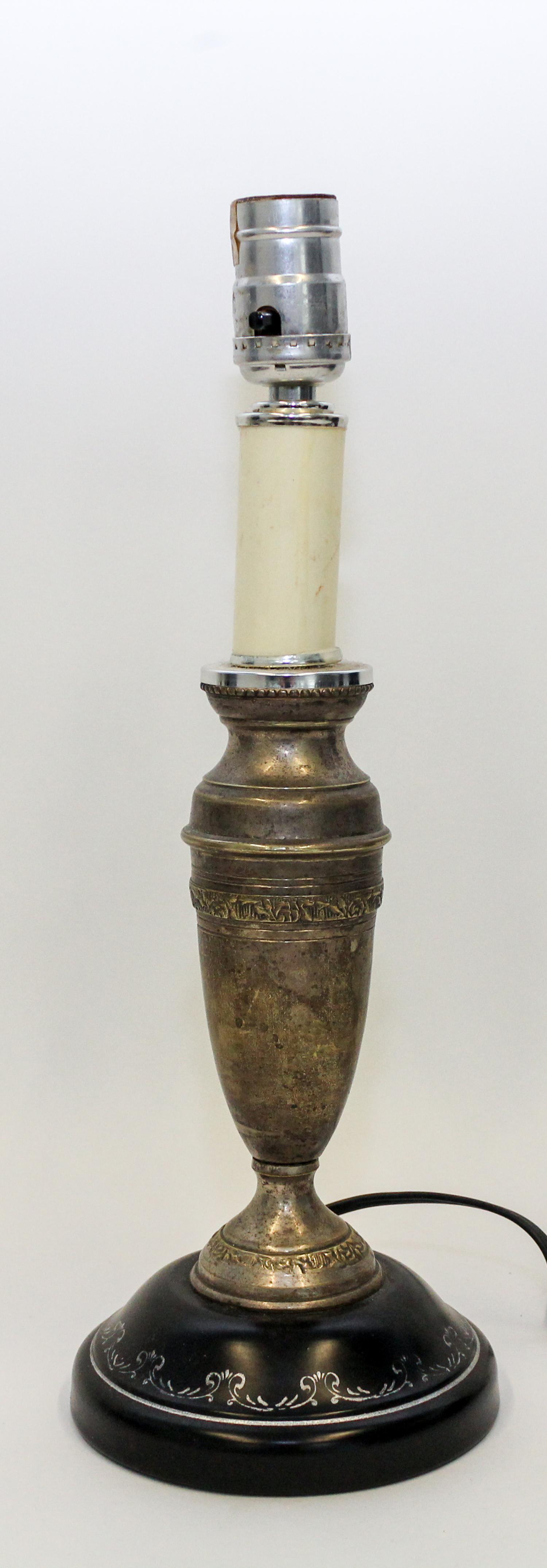 A Cast Metal Table Lamp. Height overall 14 3/4 inches.