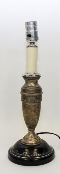 A Cast Metal Table Lamp. Height overall 14 3/4 inches.