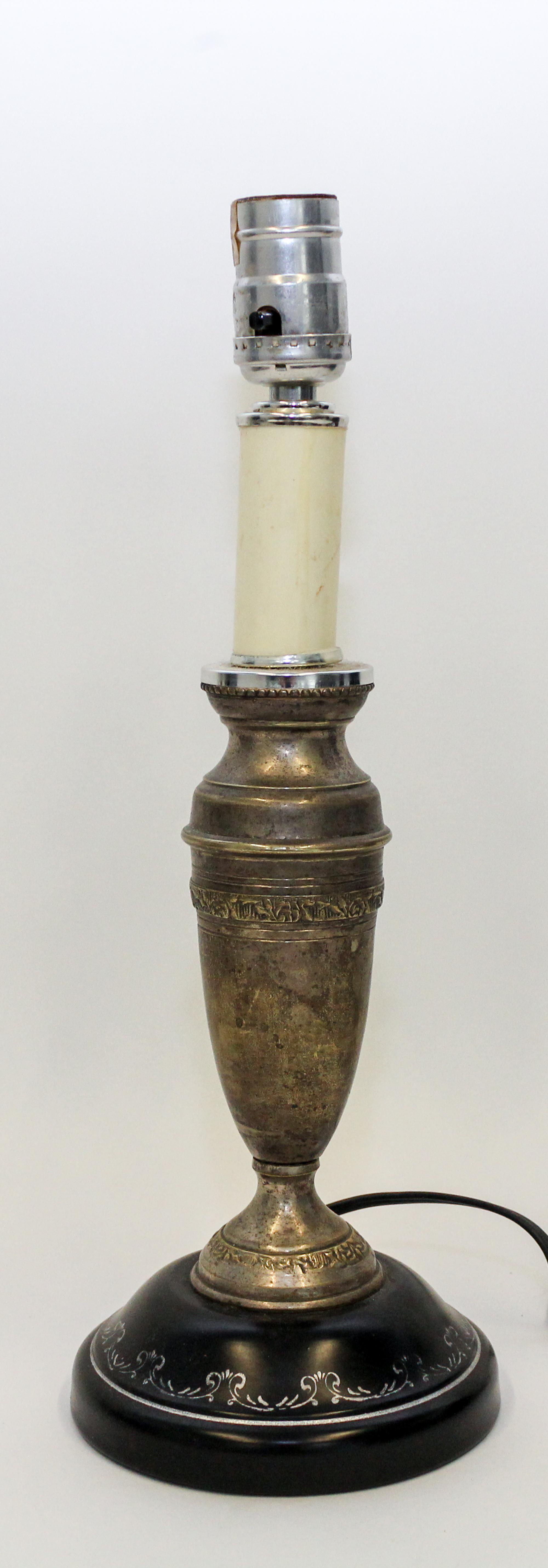 A Cast Metal Table Lamp. Height overall 14 3/4 inches.