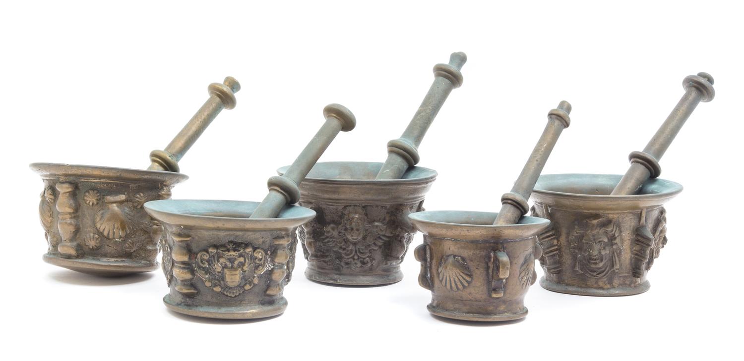 A Group of Five Mortar and Pestles Height of mortar 5 1/2 inches.