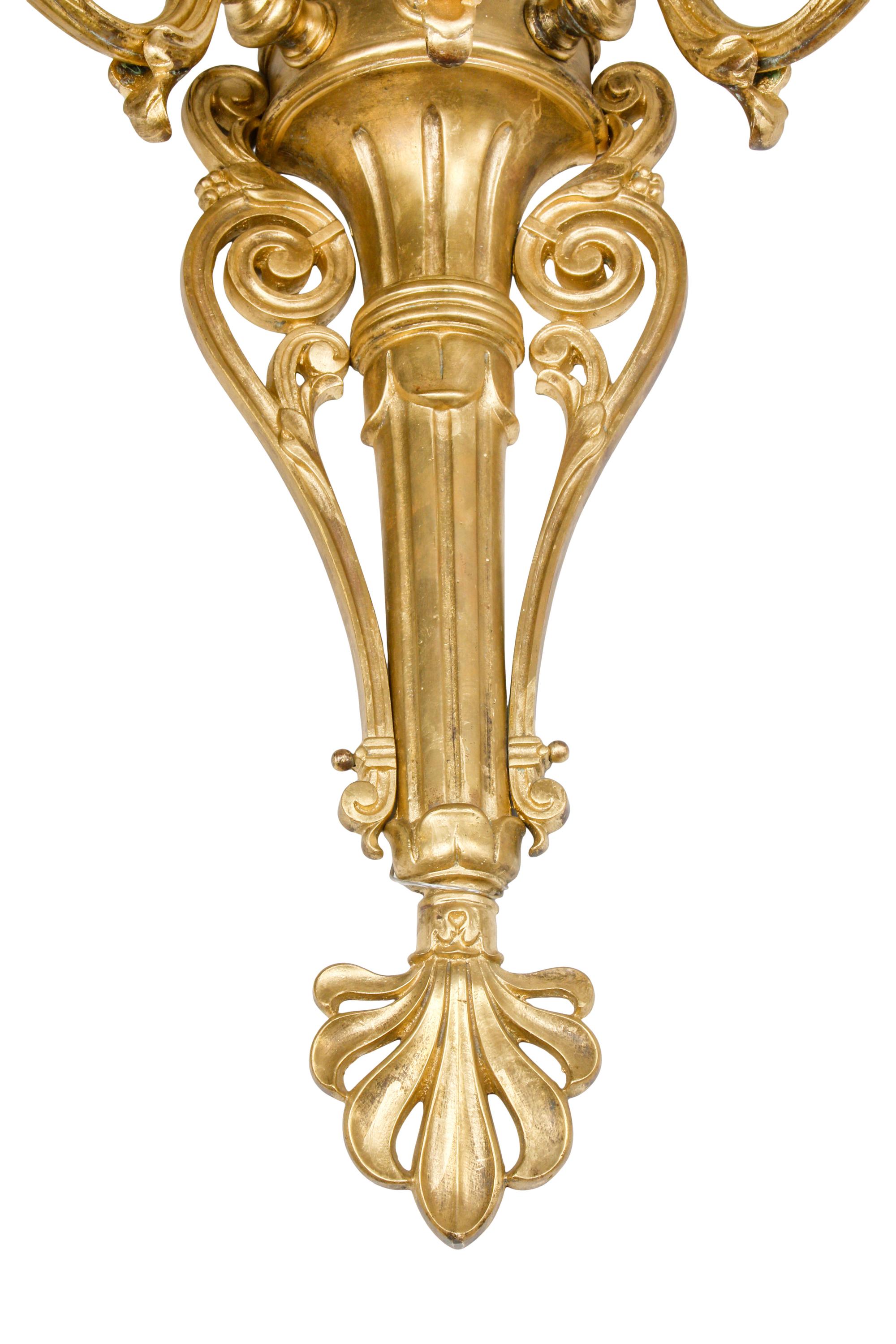 A Set of Four Large Gilt Bronze Three-Light Sconces