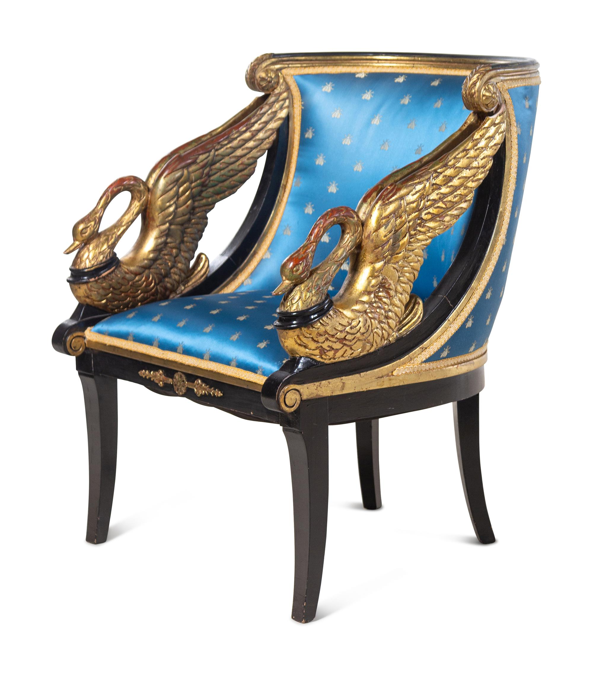 Two Empire Style Parcel Gilt Ebonized Armchairs
