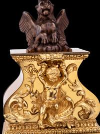 A French Gilt and Patinated Bronze Mystery Clock, with Wood Base, Attributed to Jean Eugene Robert Houdin