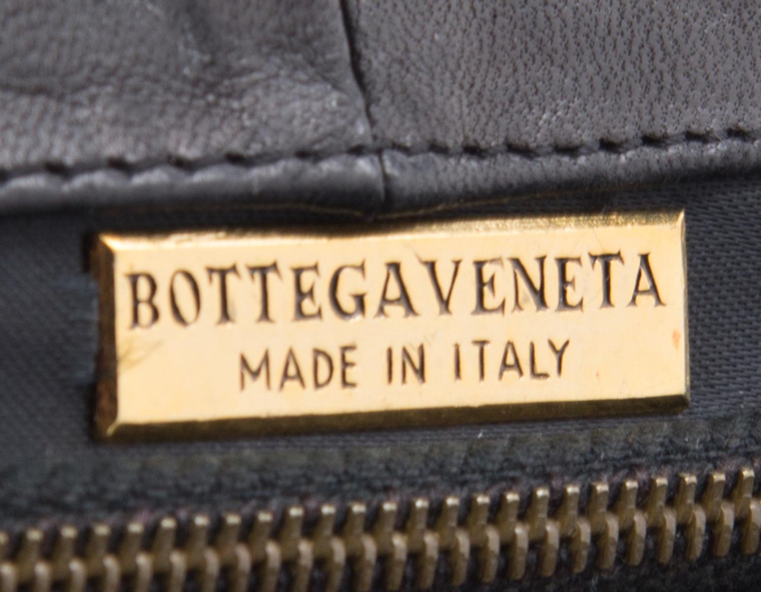 A Bottega Veneta Black Intrecciato Clutch, 11" x 8" x 1.5".