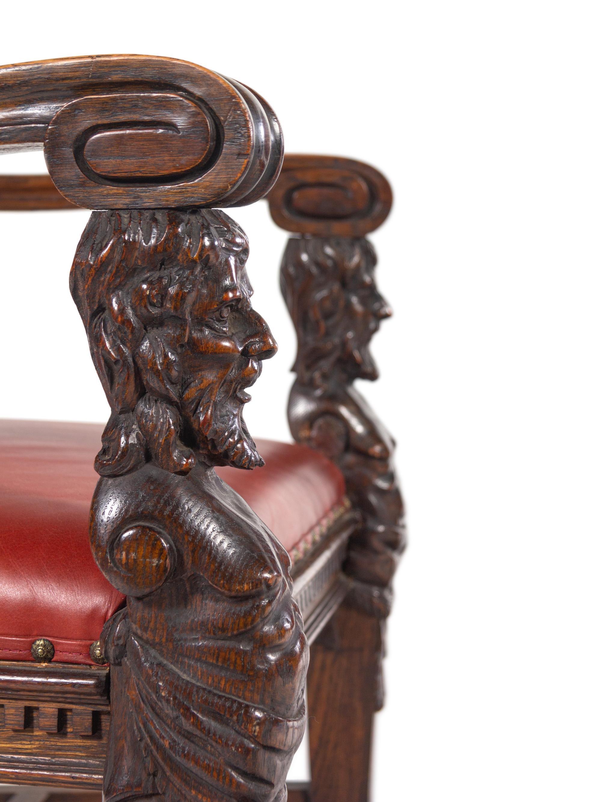 A Set of Eight R.J. Horner Carved Oak Man of the Mountain Dining Chairs