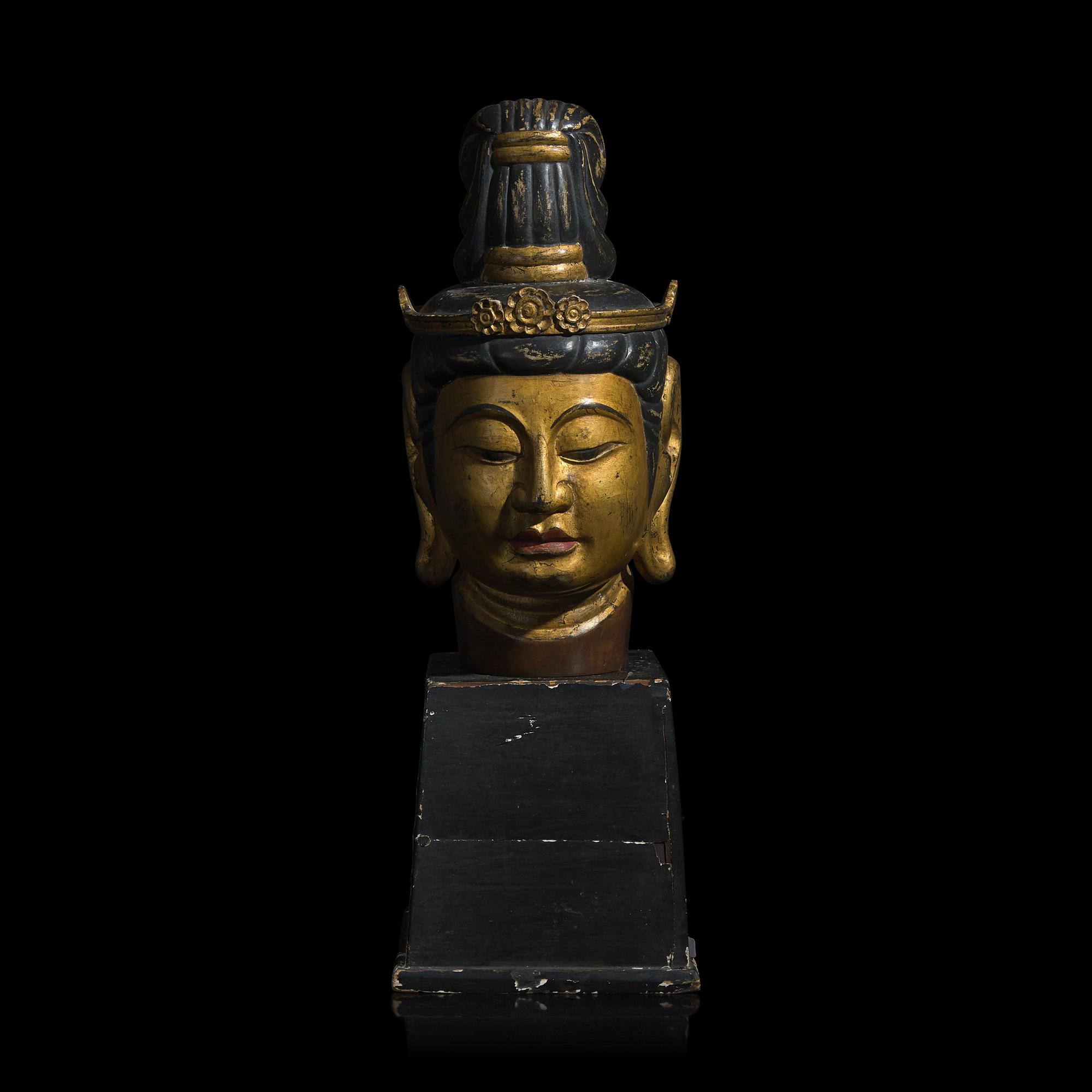 A Japanese Gilt and Black Painted Wood Head of a Bosatsu