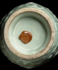 A Chinese Molded Celadon Glazed Porcelain Vase