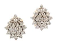 A Pair of 14 Karat Yellow Gold and Diamond Cluster Earrings, 4.10 dwts.