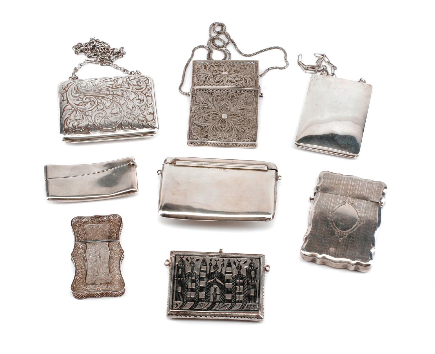 A Collection of Eight Silver Card Cases, Late 19th/Early 20th Century, comprising two unmarked filigree examples, a Niello decorated ex