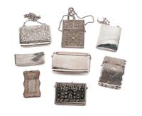 A Collection of Eight Silver Card Cases, Late 19th/Early 20th Century, comprising two unmarked filigree examples, a Niello decorated ex