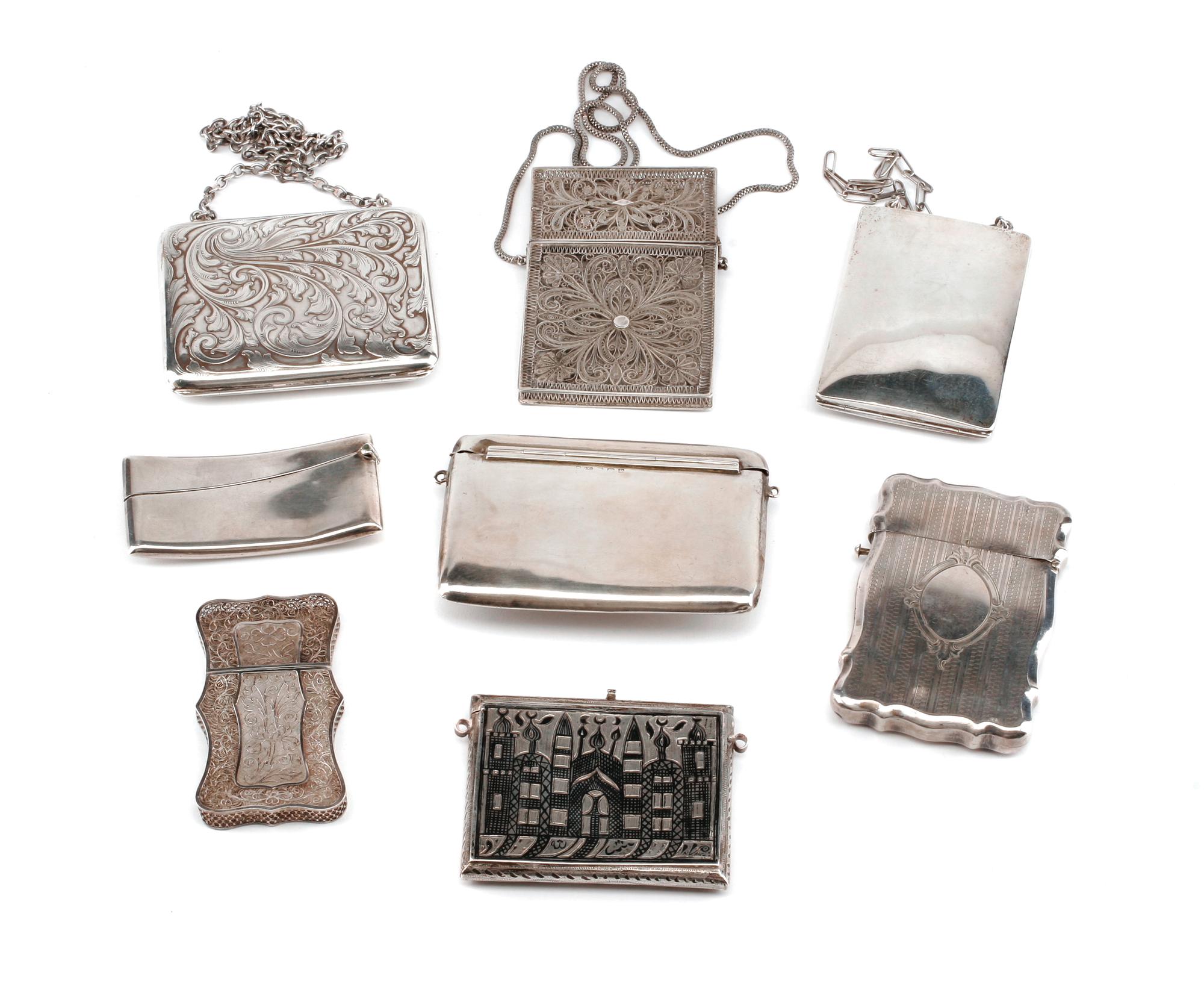 A Collection of Eight Silver Card Cases, Late 19th/Early 20th Century, comprising two unmarked filigree examples, a Niello decorated ex