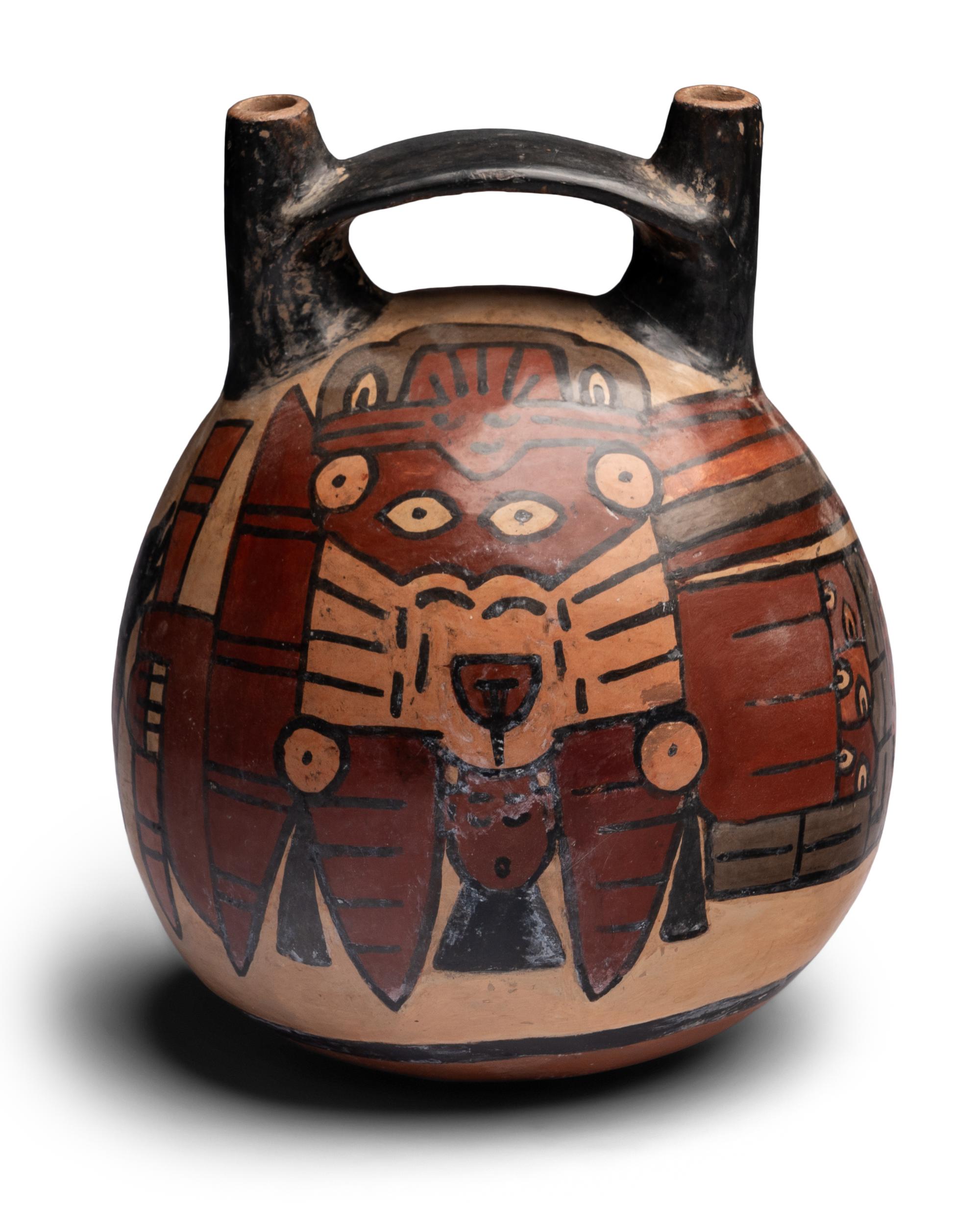 A Nazca Style Polychrome Stirrup Vessel