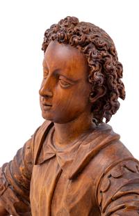 An Italian Carved Wood Figure of a Boy