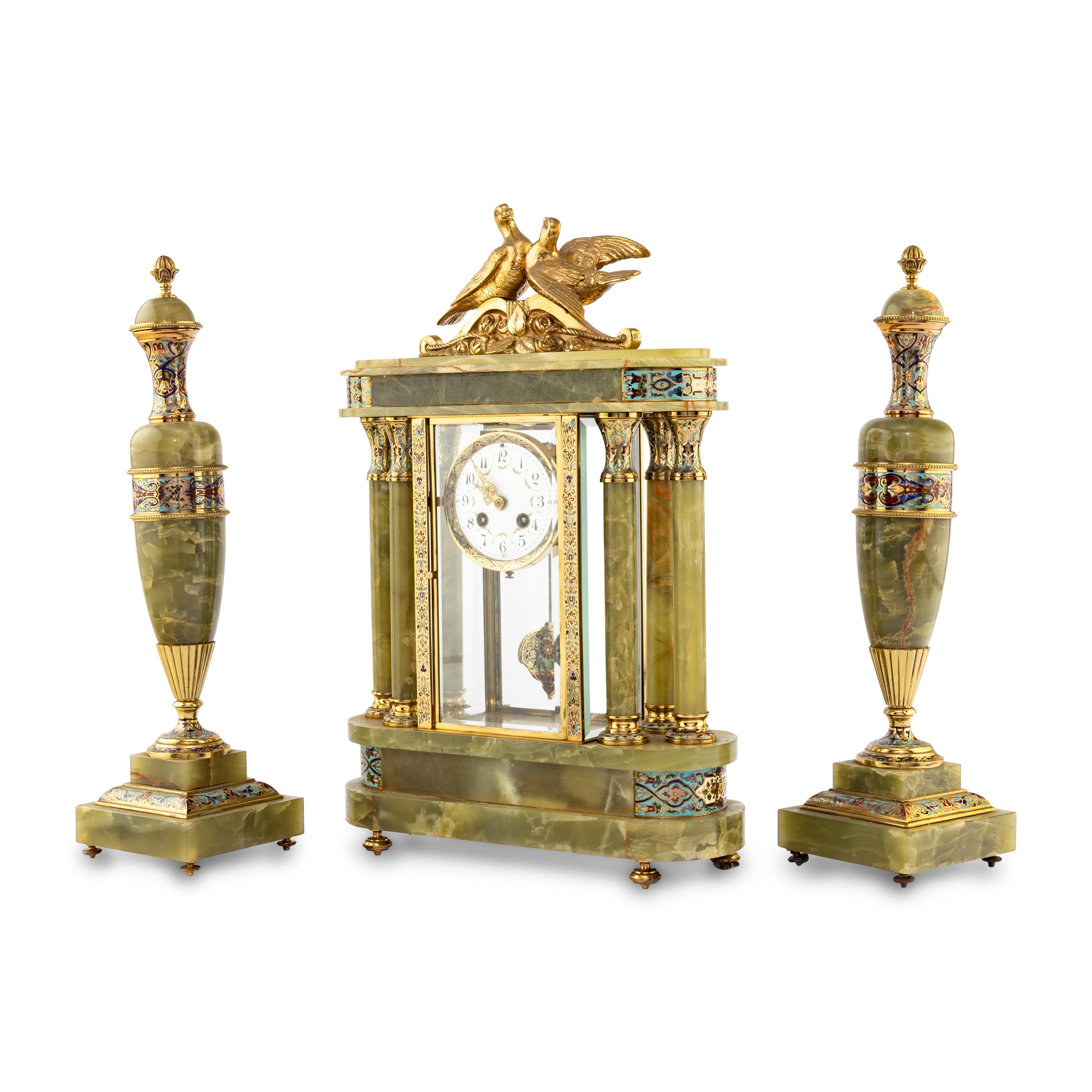 A French Green Onyx, Gilt-Metal and Champlevé Three-Piece Clock Garniture