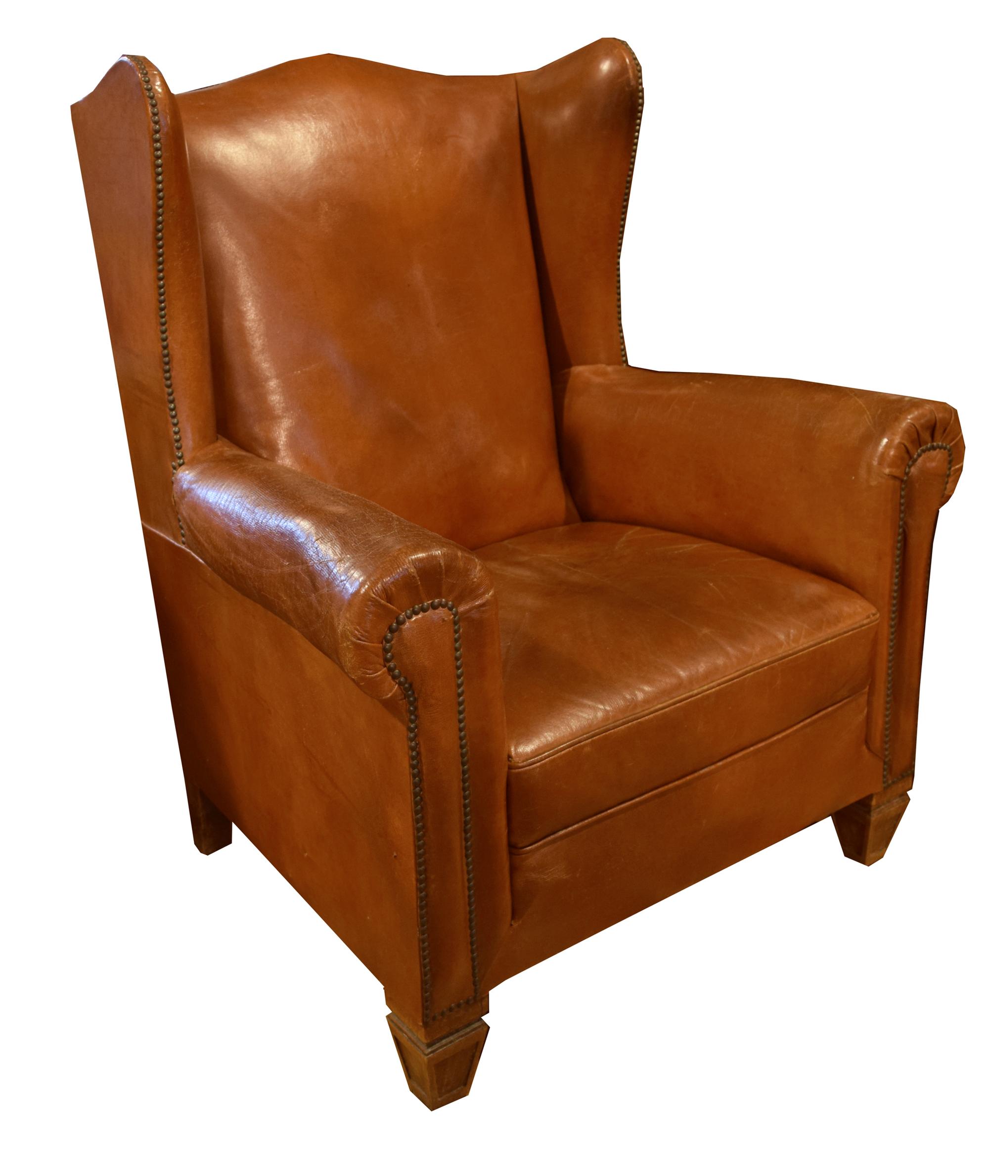 A Leather Upholstered Wingback Chair 34.5" W x 30" D x 41" H — Italy, Circa 1910