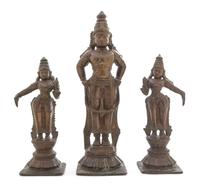 An Indian Bronze Triad of Vishnu with Consorts Height of tallest 16 1/4 inches. — 19TH CENTURY
