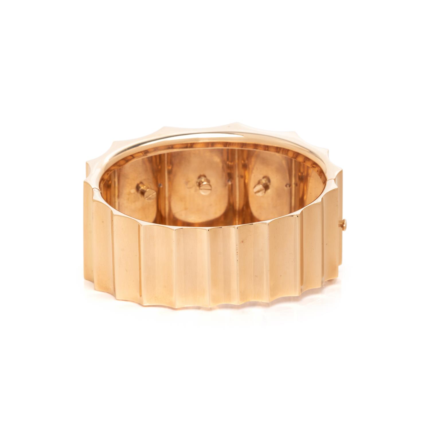 YELLOW GOLD, PLATINUM AND DIAMOND BANGLE BRACELET