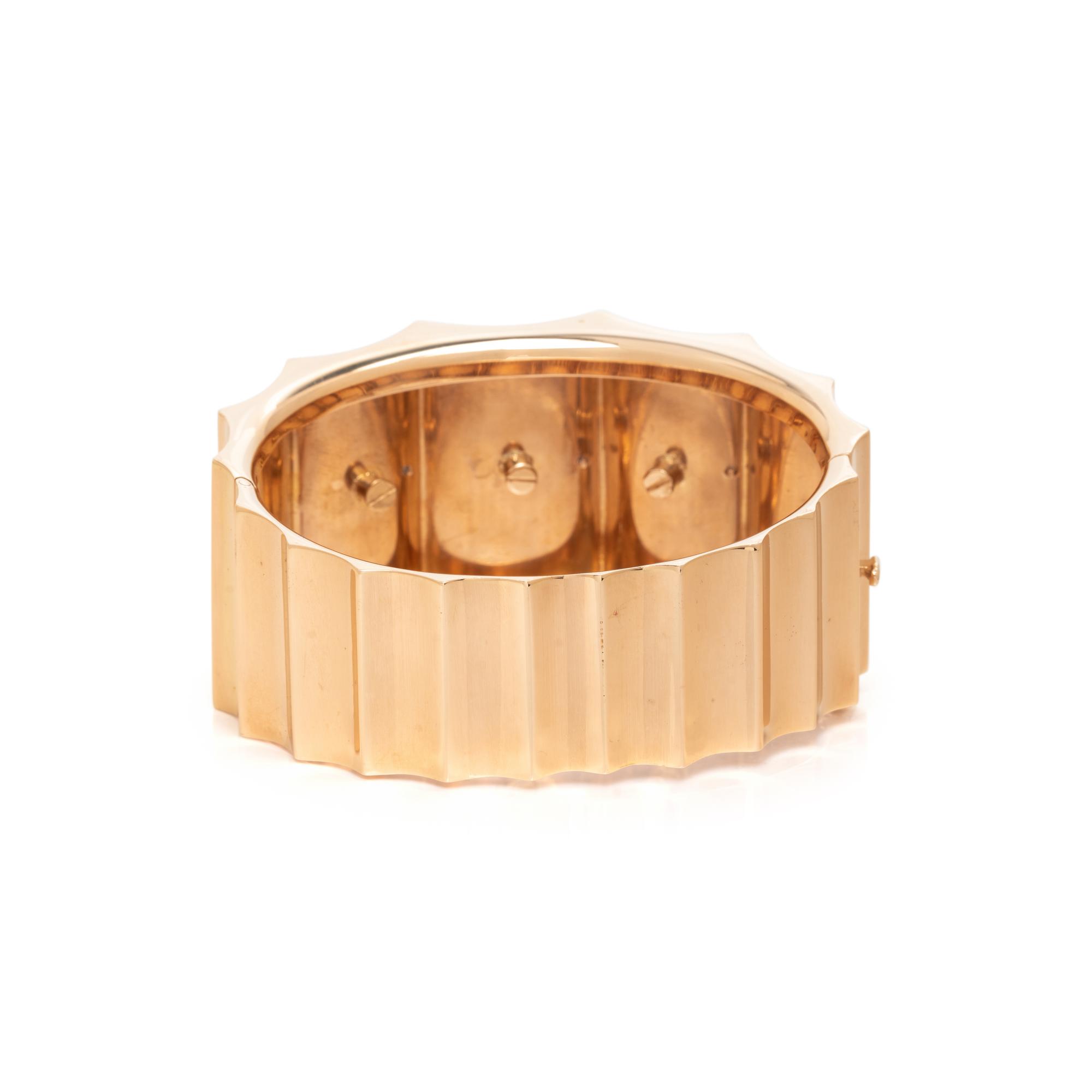 YELLOW GOLD, PLATINUM AND DIAMOND BANGLE BRACELET