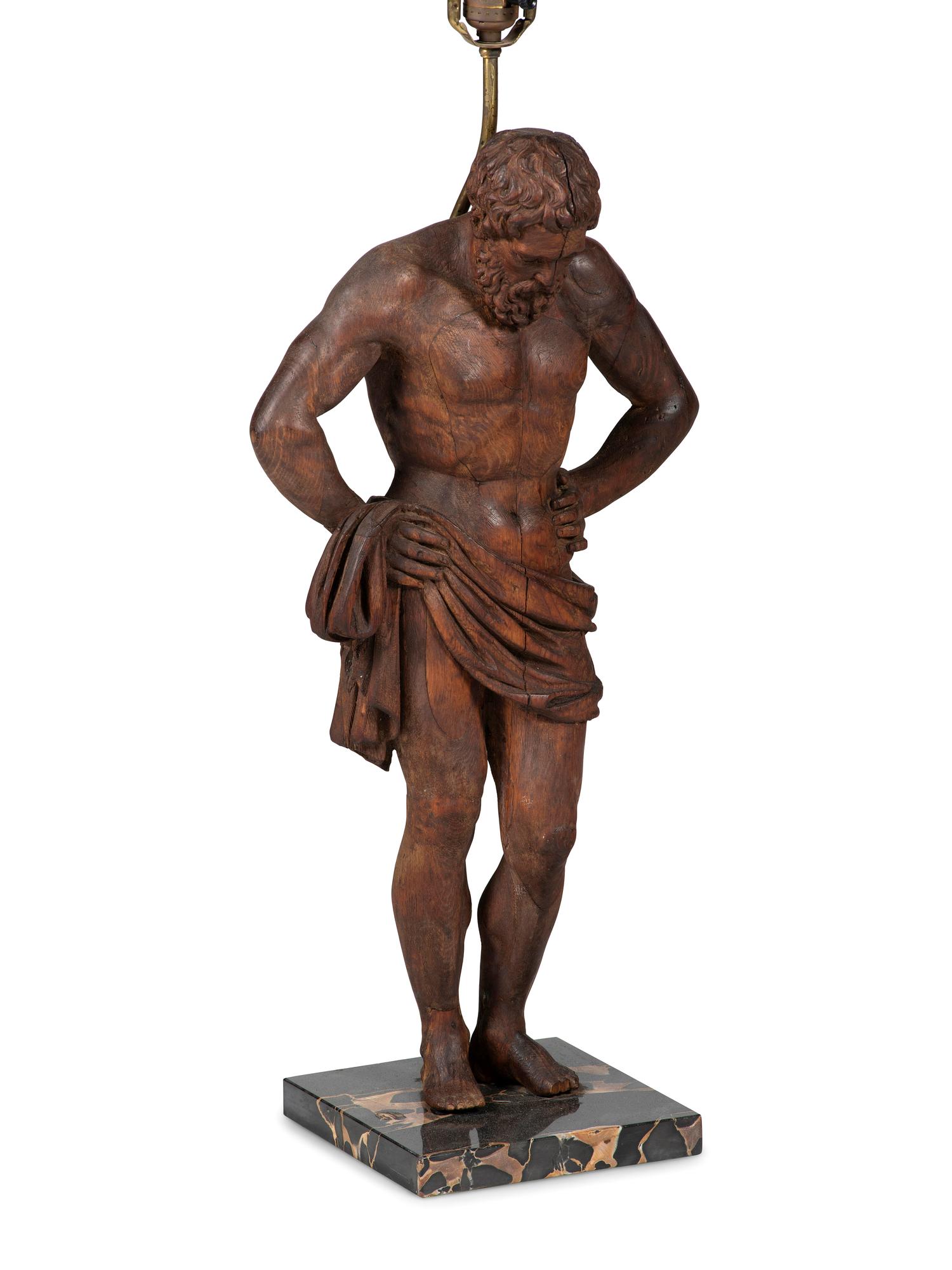 A Pair of Carved Pine Figures of Classical Men
