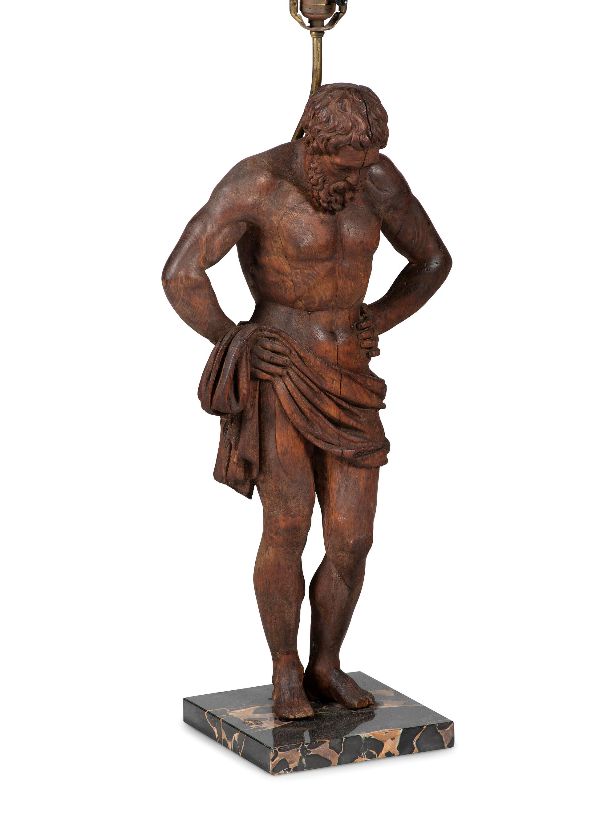 A Pair of Carved Pine Figures of Classical Men