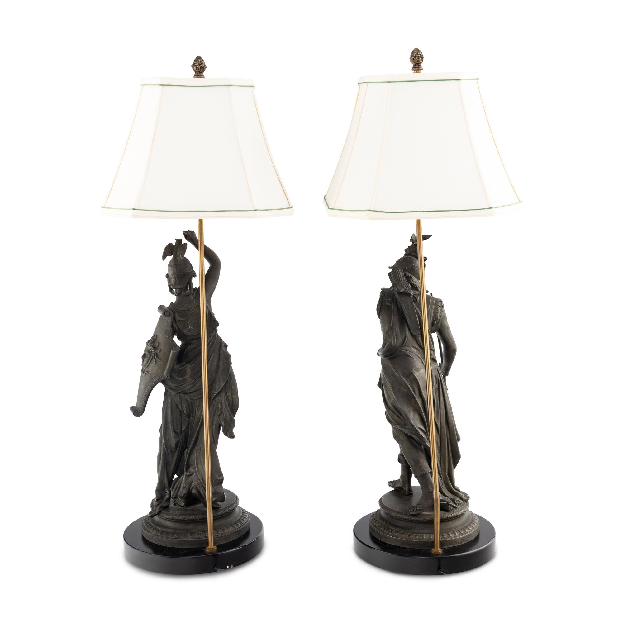 A Pair of French Cast Metal Figures Mounted as Lamps