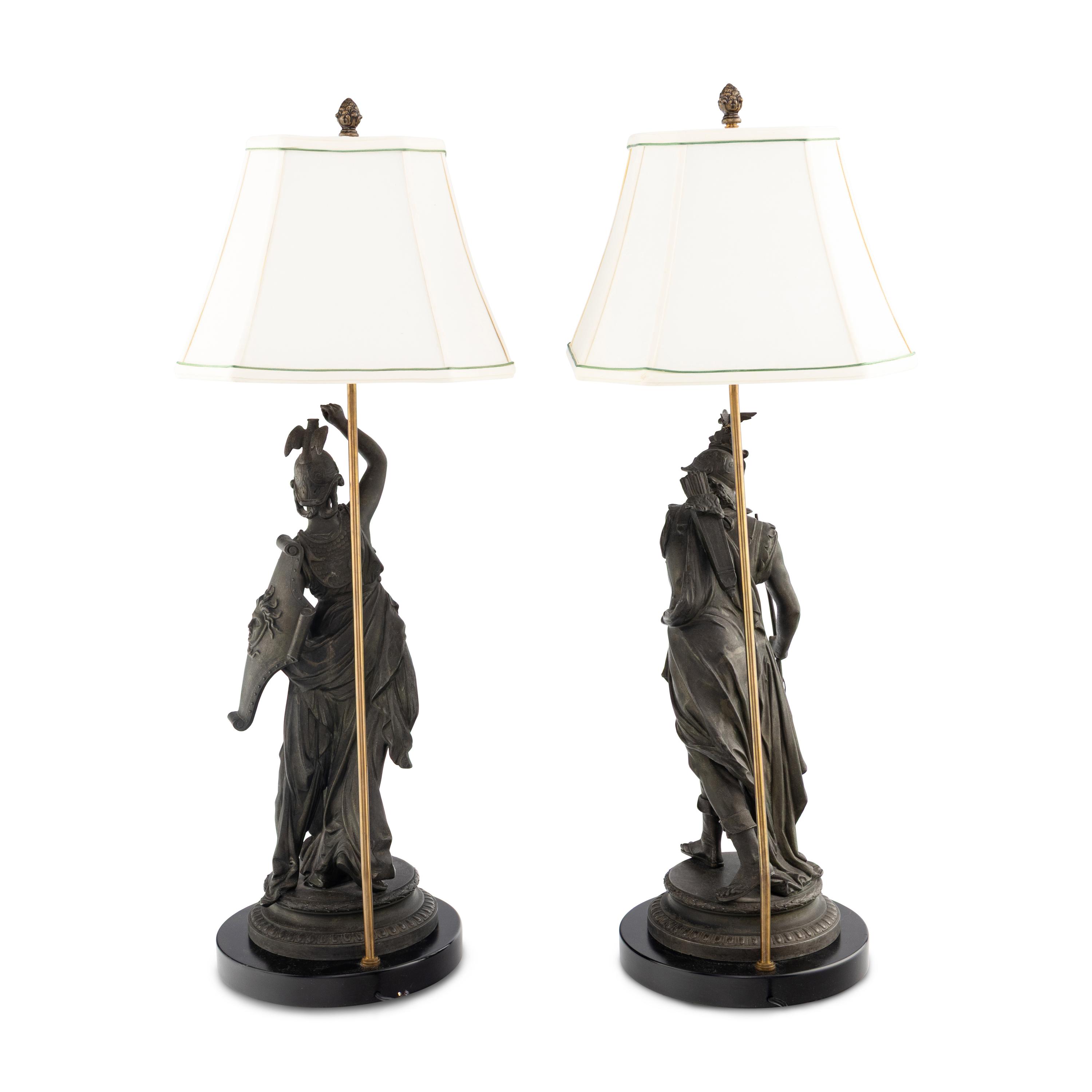 A Pair of French Cast Metal Figures Mounted as Lamps