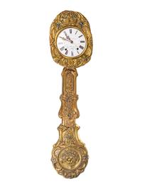 A French Repousséd Brass Comtoise Clock — 19TH CENTURY