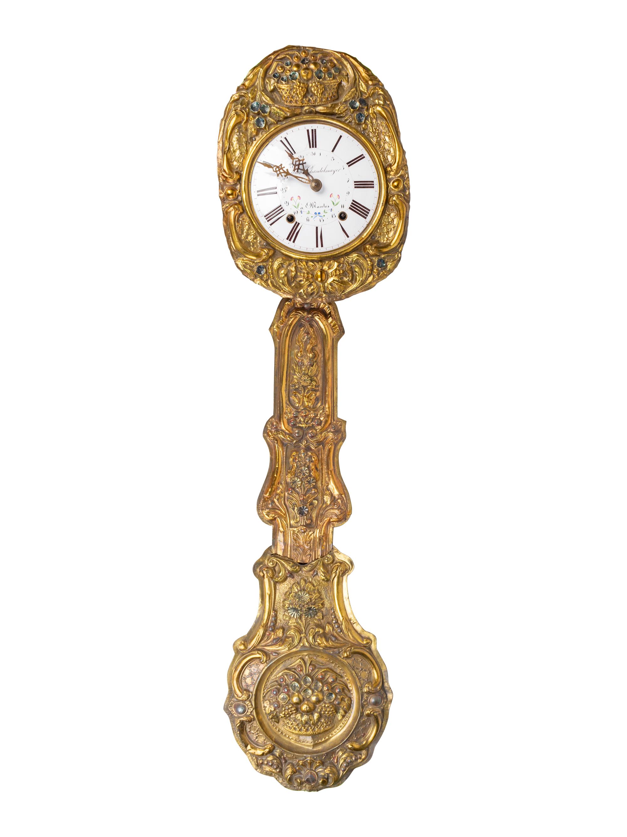 A French Repousséd Brass Comtoise Clock — 19TH CENTURY