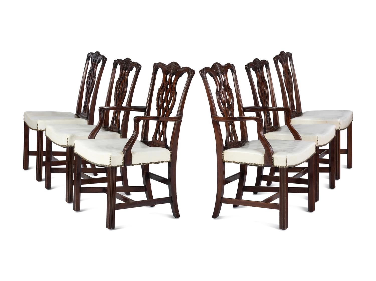 A Set of Six Chippendale Style Carved Mahogany Dining Chairs