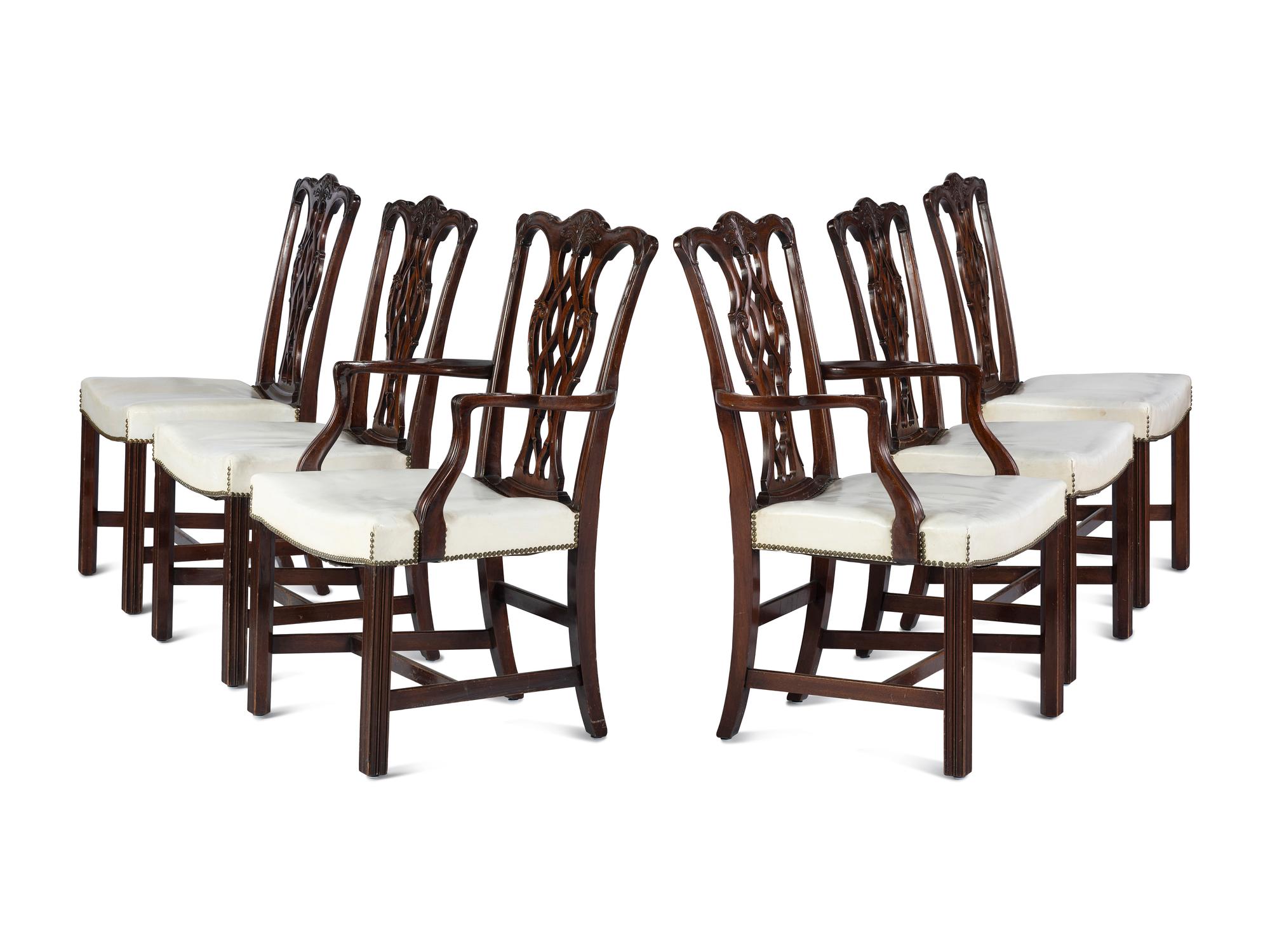 A Set of Six Chippendale Style Carved Mahogany Dining Chairs