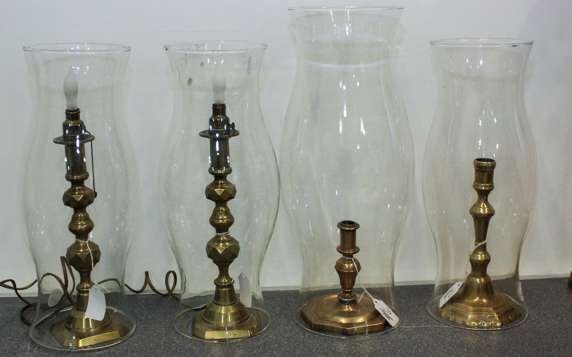 Two Pairs of Brass Candlesticks Height of taller pair 9 3/4 inches. — 19TH CENTURY