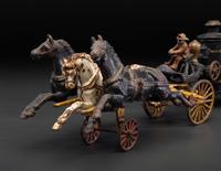 A Painted Cast Iron Three-Horse Fire Pump Wagon Toy