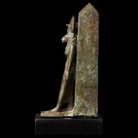 An Egyptian Bronze Lion-Headed Goddess and Obelisk
