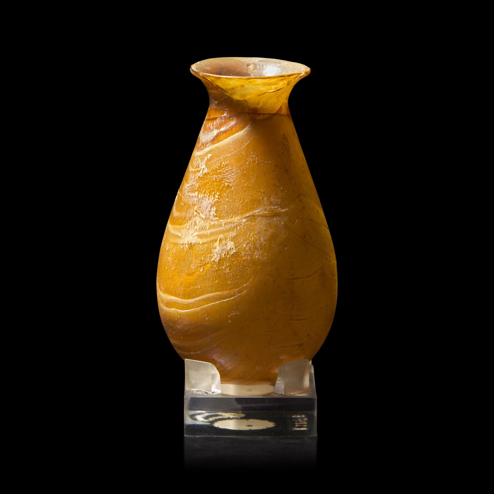 A Roman Amber Marbled Glass Flask