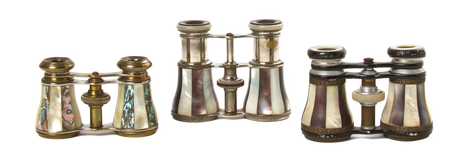 Three Pairs of French Mother-of-Pearl Veneered Opera Glasses, Width of widest 4 inches.