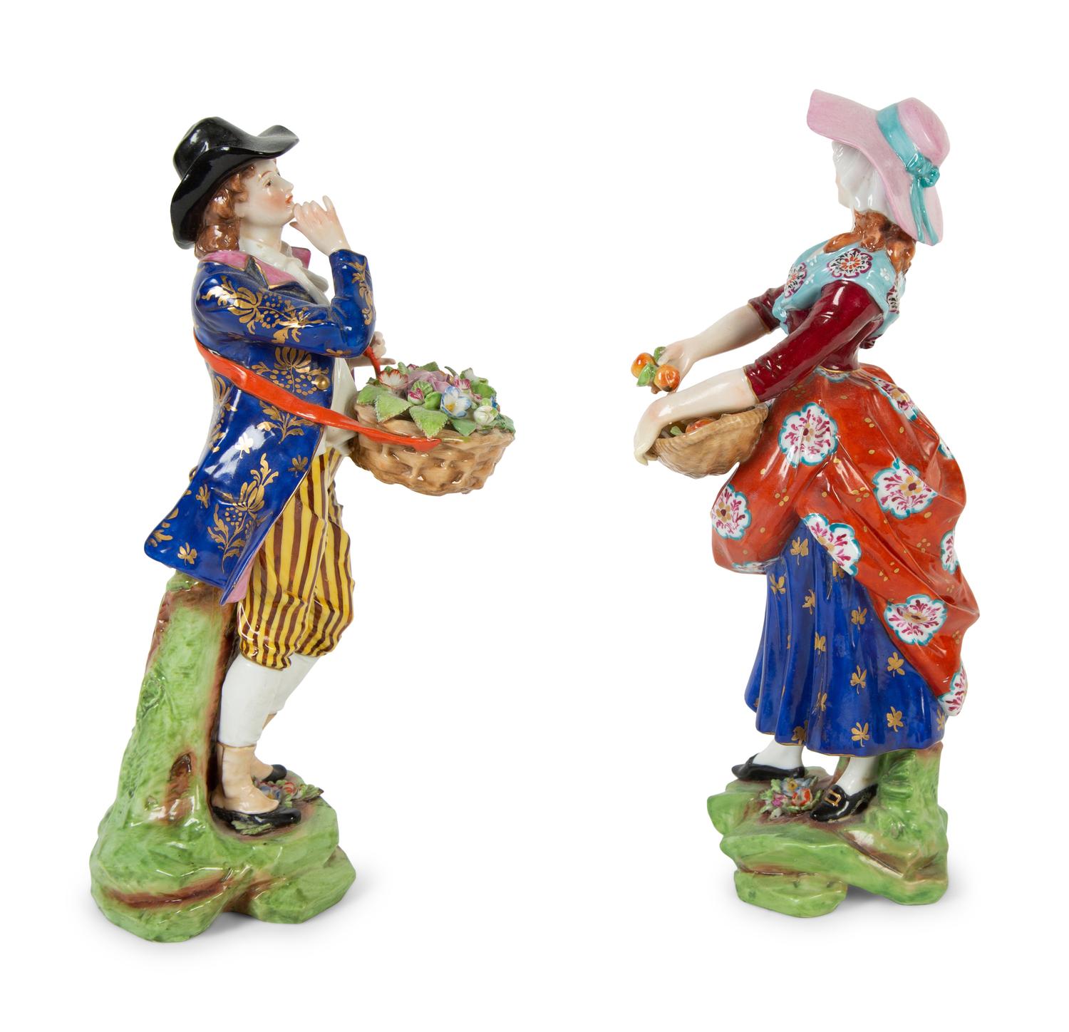 A Pair of Chelsea Porcelain Figures