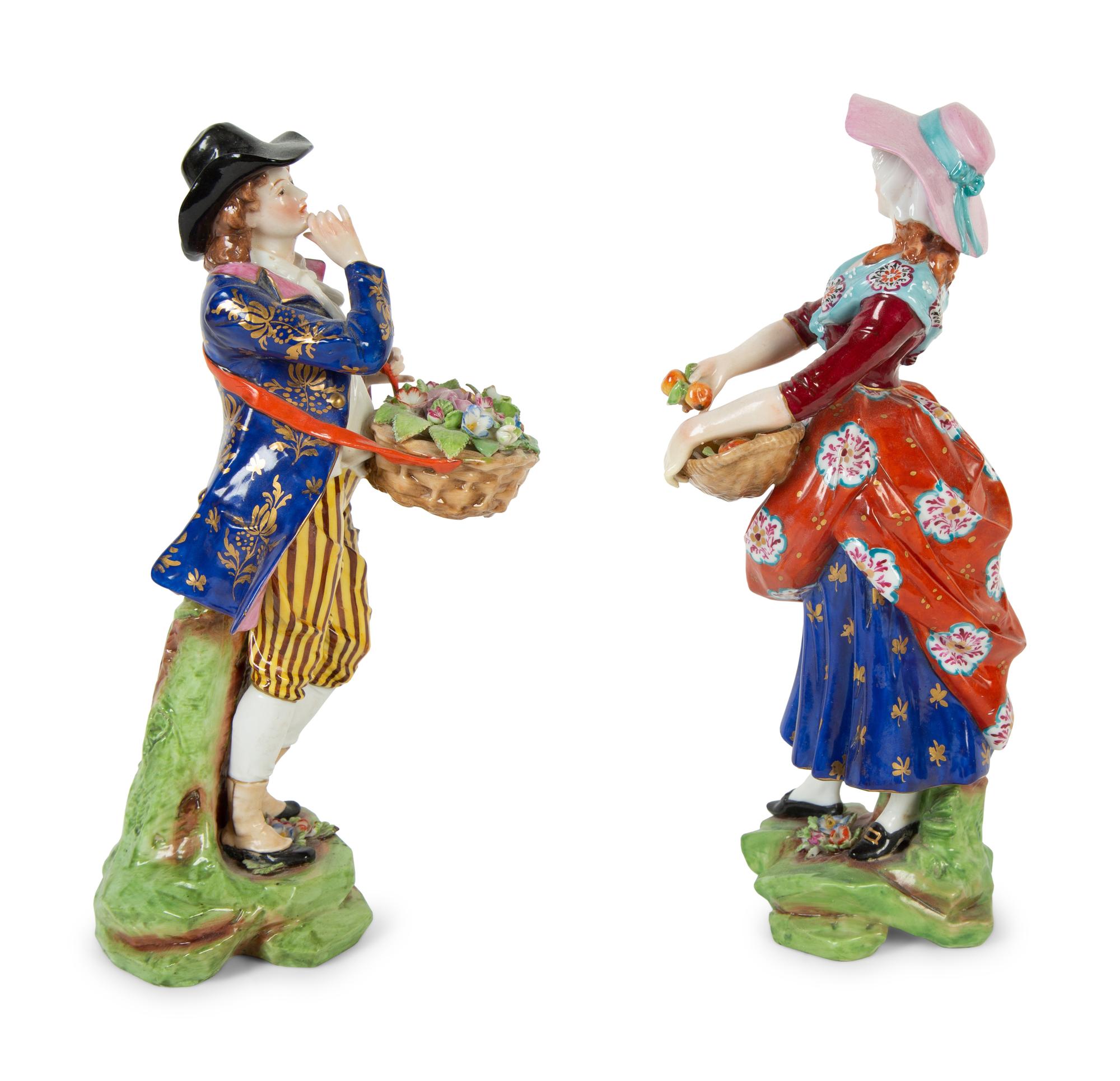 A Pair of Chelsea Porcelain Figures