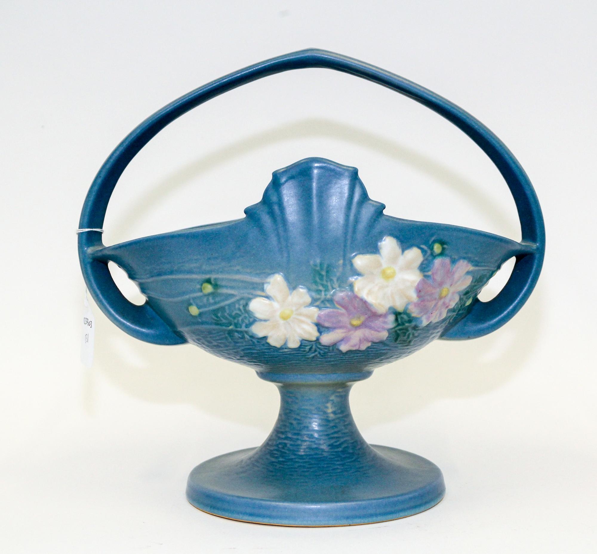 A Roseville Pottery Basket Height over handle 12 inches.