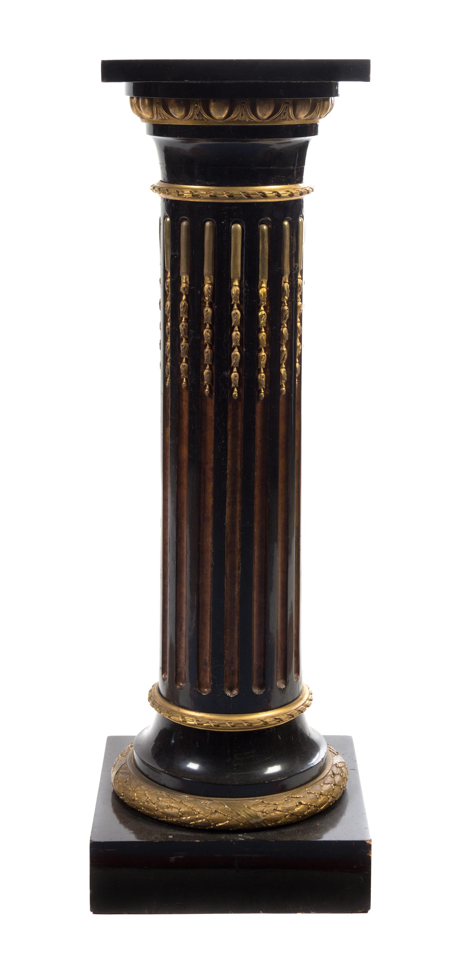 A Gilt Bronze Mounted and Parcel Gilt Ebonized Pedestal Height 45 1/2 inches.