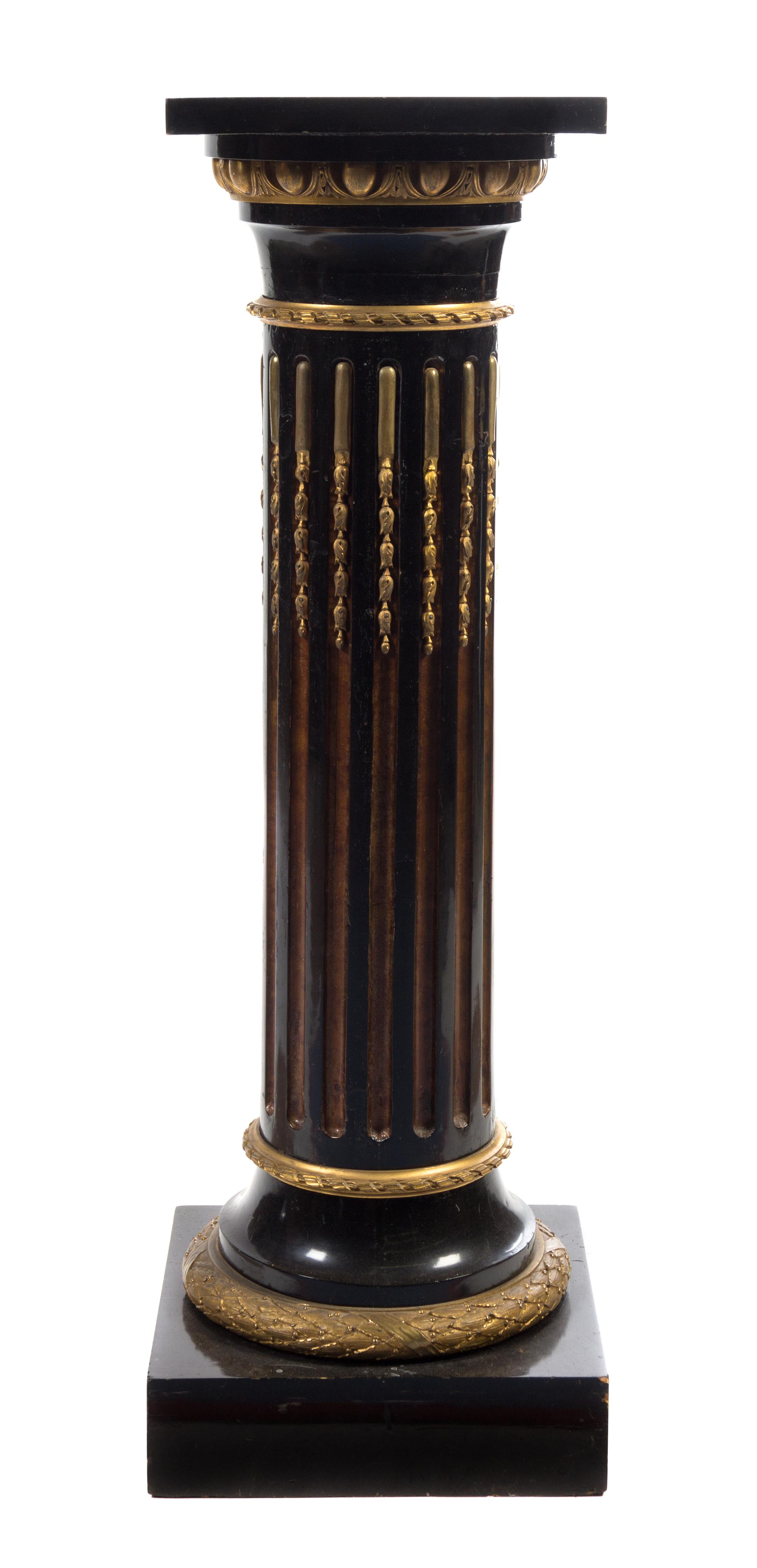 A Gilt Bronze Mounted and Parcel Gilt Ebonized Pedestal Height 45 1/2 inches.