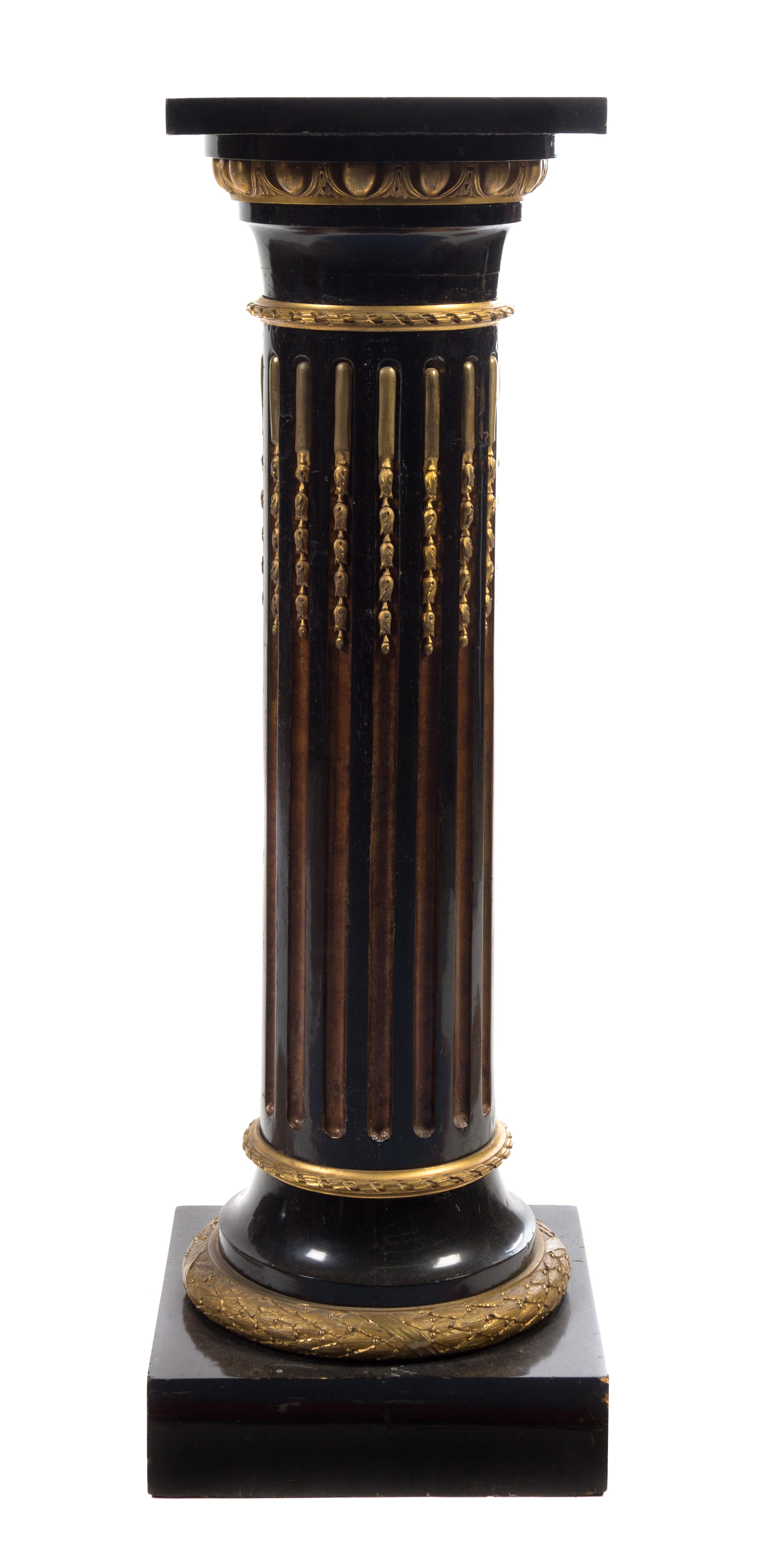 A Gilt Bronze Mounted and Parcel Gilt Ebonized Pedestal Height 45 1/2 inches.